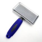 Image of Pet Grooming Steel Brush with plastic handle